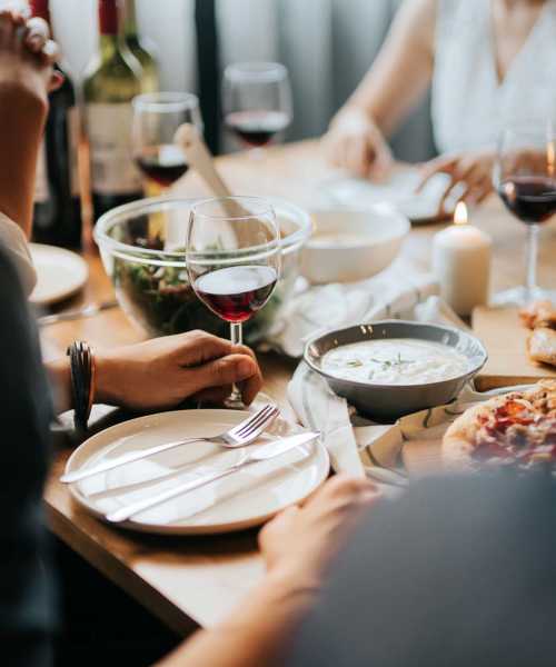 Residents enjoying food and drinks at Fuller's Woods Apartments in Madison, Wisconsin