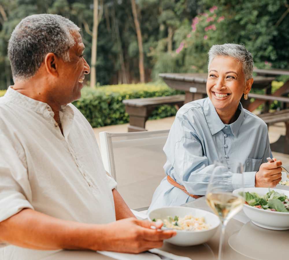 Resident couple having food near The Huntington in Morgan Hill, California