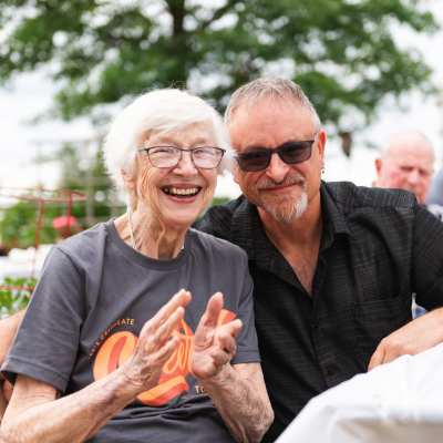 Group of residents cheering at Meadows on Fairview in Wyoming, Minnesota