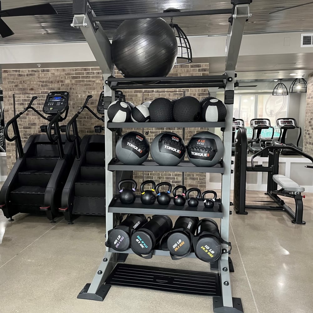 Gym with weights and machines at Edge 35 in Indianapolis, Indiana  
