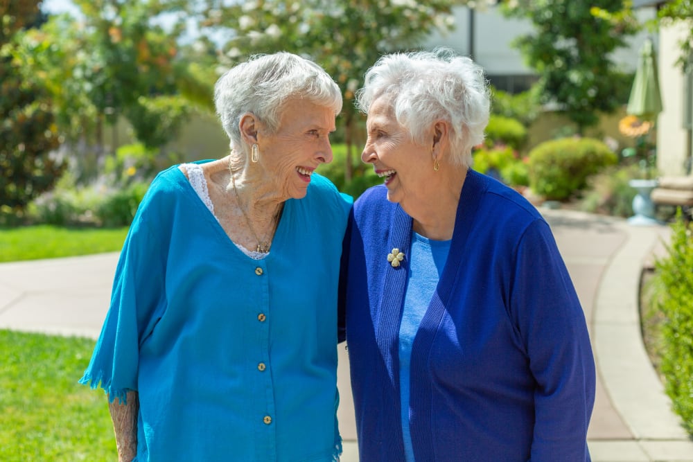 Two ladies enjoying the sunshine at Merrill Gardens at Brentwood in Brentwood, California. 