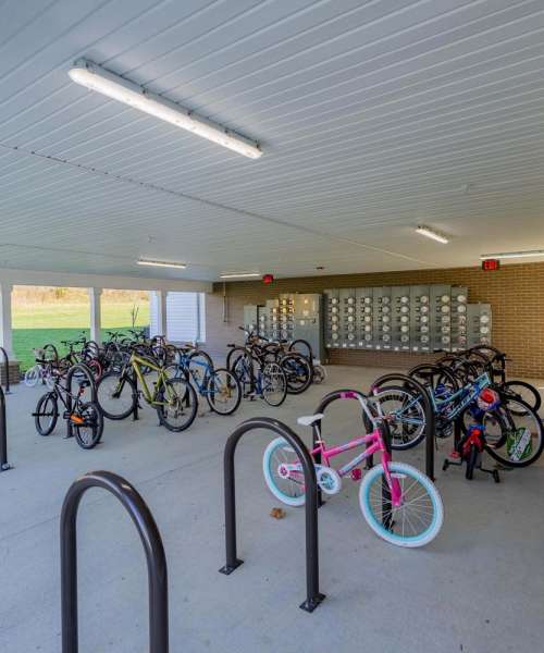 A covered bike parking with bike rack at Kershaw Greene III in Athens, Ohio