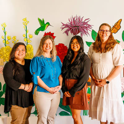 Professional caregiving team posing for a photo at Peoples Senior Living in Tacoma, Washington