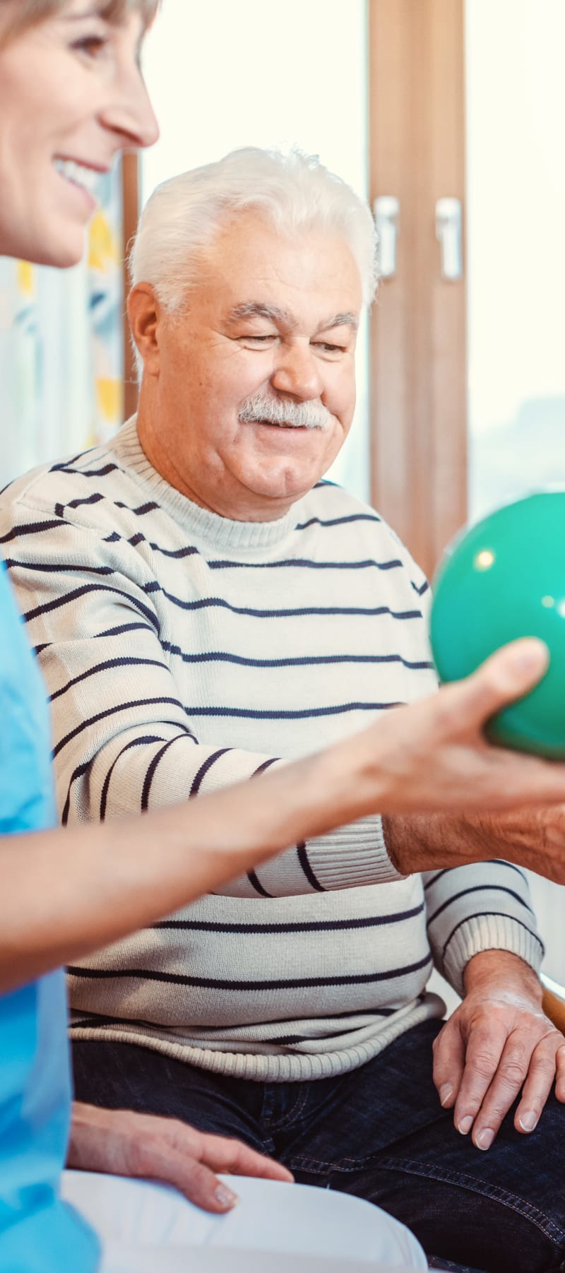 Resident with ball at Montello Care Center in Montello, Wisconsin