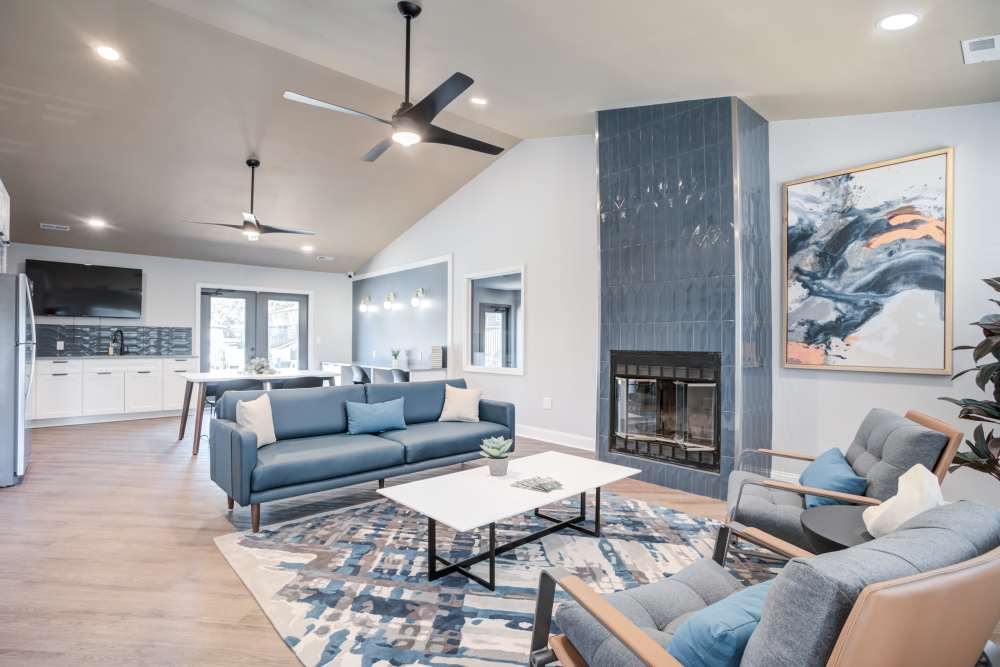 Newly renovated clubhouse with large fireplace and kitchen
