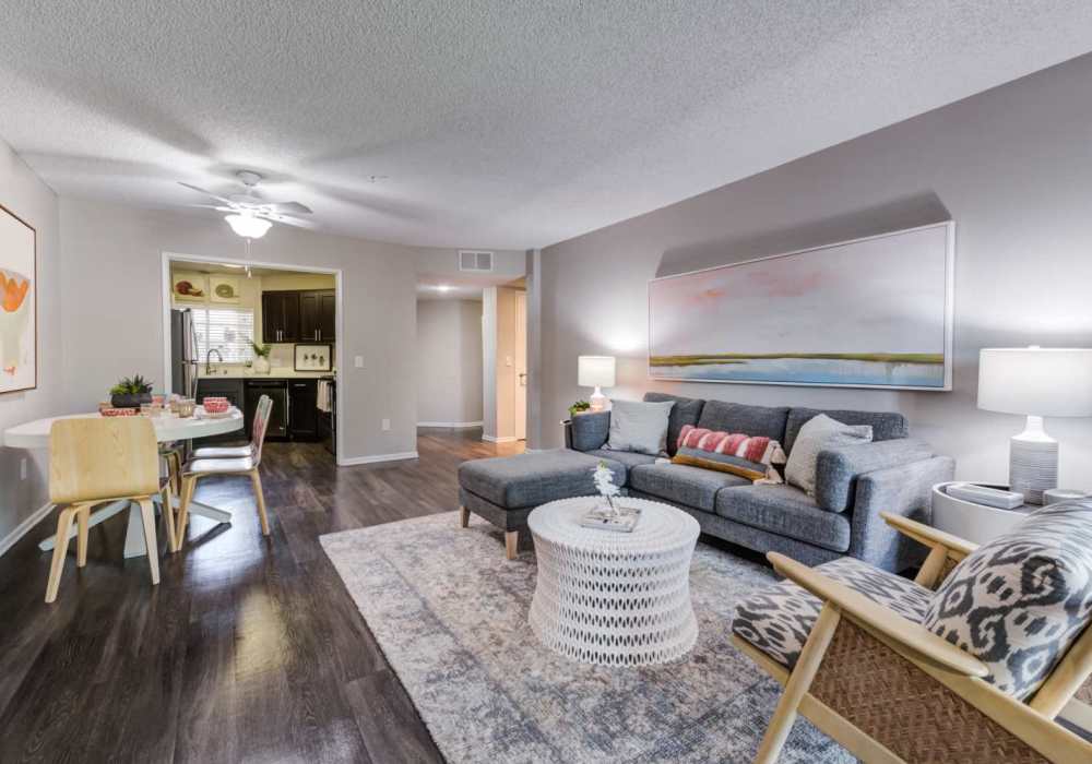 Modern living room with access to kitchen at The Bluffs in Rancho Cucamonga, California