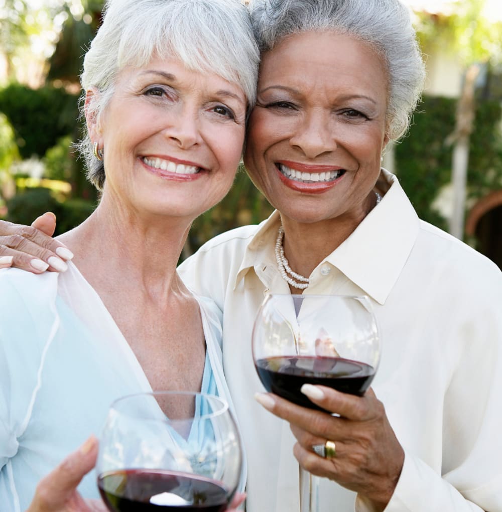 Two residents enjoying a glass of win at Blossom Ridge in Oakland Charter Township, Michigan