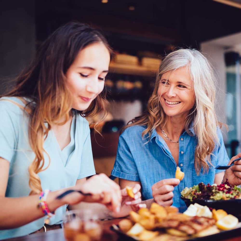 Elderly woman having lunch with her daughter near Bramblewood in New Haven, Michigan