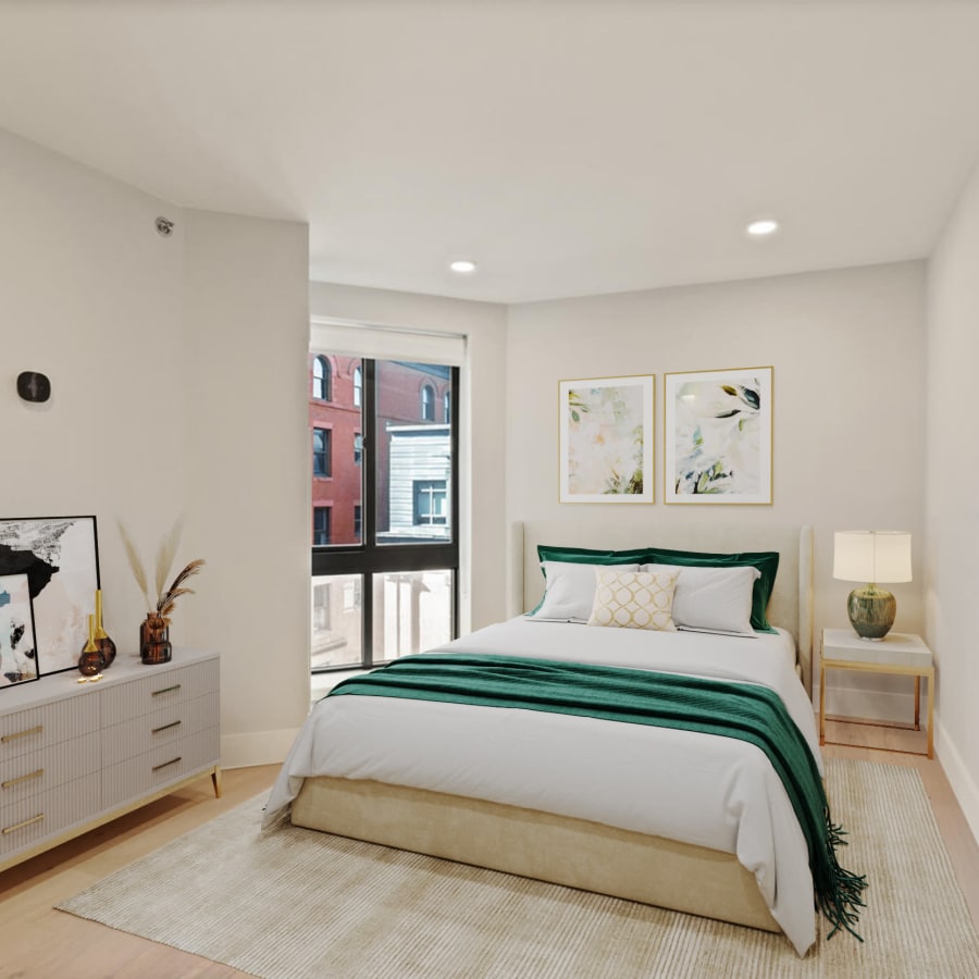 Model bedroom with natural light at 28 Exeter at Newbury in Boston, Massachusetts