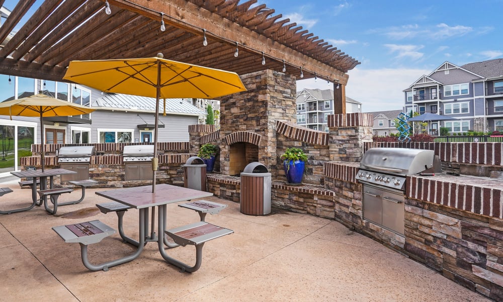 Outdoor grill and seating at Cottages at Crestview in Wichita, Kansas