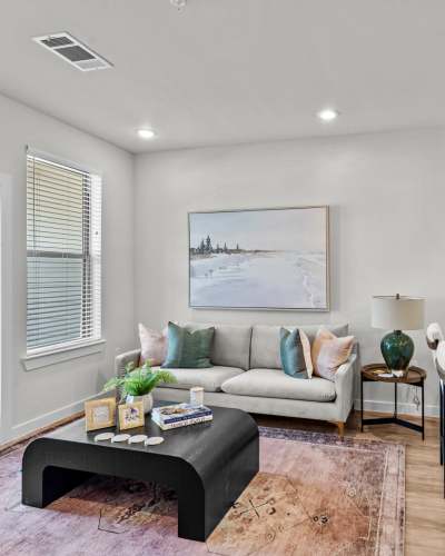 Bright living room at Arden at Kohlers Crossing in Kyle, Texas