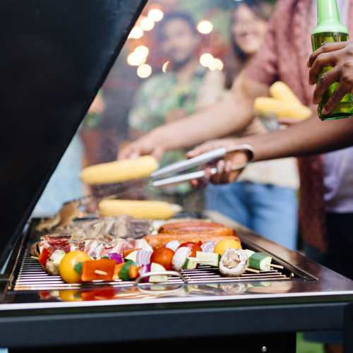 Resident using grill at 30 Metro in Omaha, Nebraska