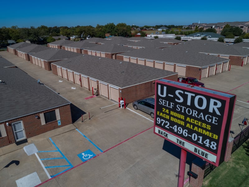 A view of the leasing office and sign at U-Stor First St. in Garland, Texas