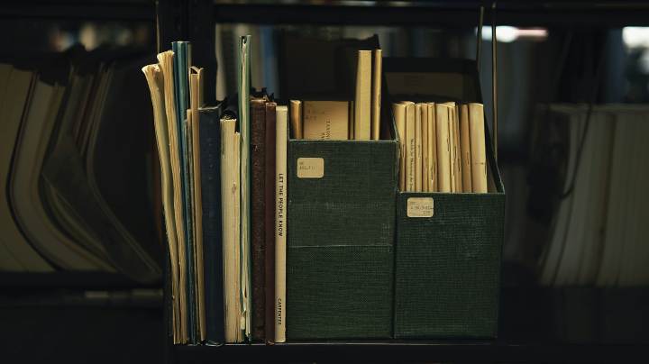 organized papers and files on a shelf