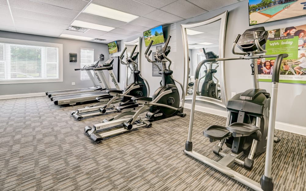 Well-equipped fitness center with cardio equipment at Fox Run Apartments & Townhomes in Bear, Delaware