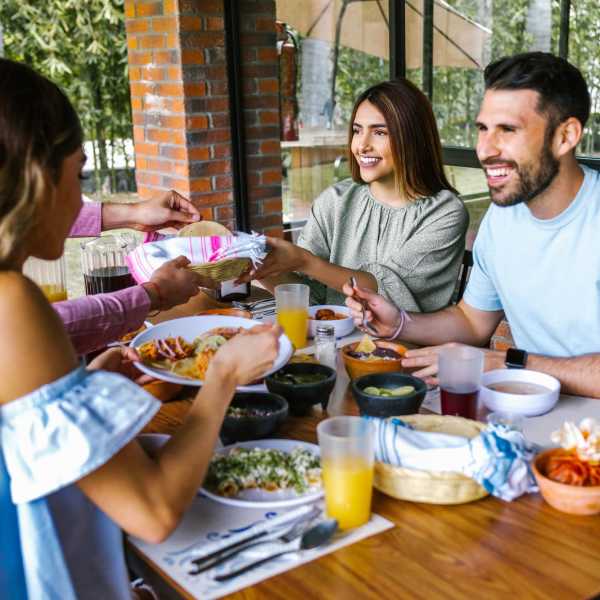 Residents enjoy a meal near The Carlton at Greenbrier, Chesapeake, Virginia