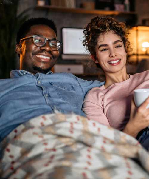 Couple watching TV together at Granite Creek in Rocklin, California