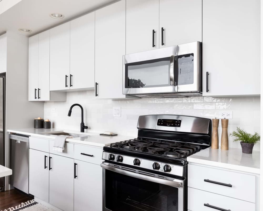 Kitchen with white cabinetries at 1758 Spring Water in Clarksville, Tennessee.