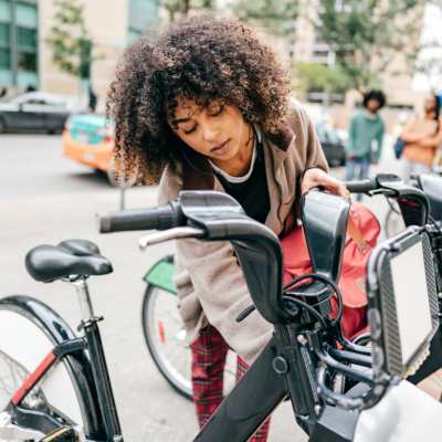 Resident using a bike to commute near The Madison in Charlotte, North Carolina