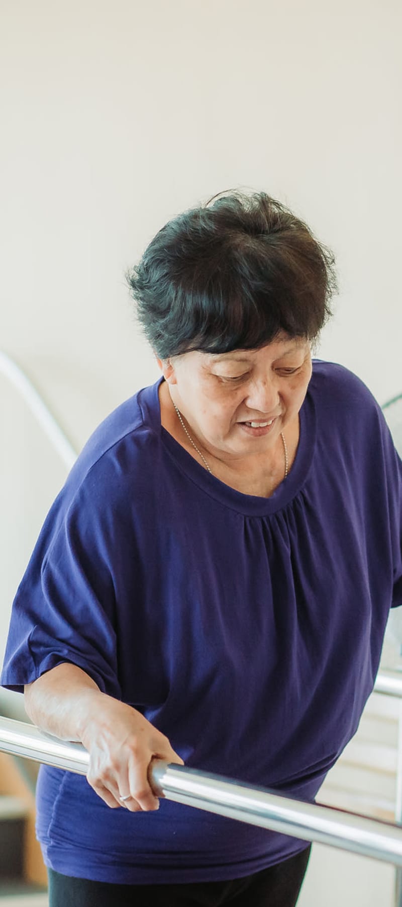 Resident working with a physical therapist on walking at Retirement Ranch in Clovis, New Mexico