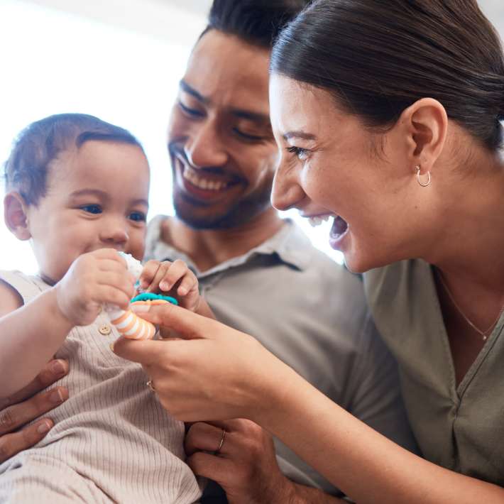 A happy family in their apartment at Elevations One, Woodbridge, Virginia