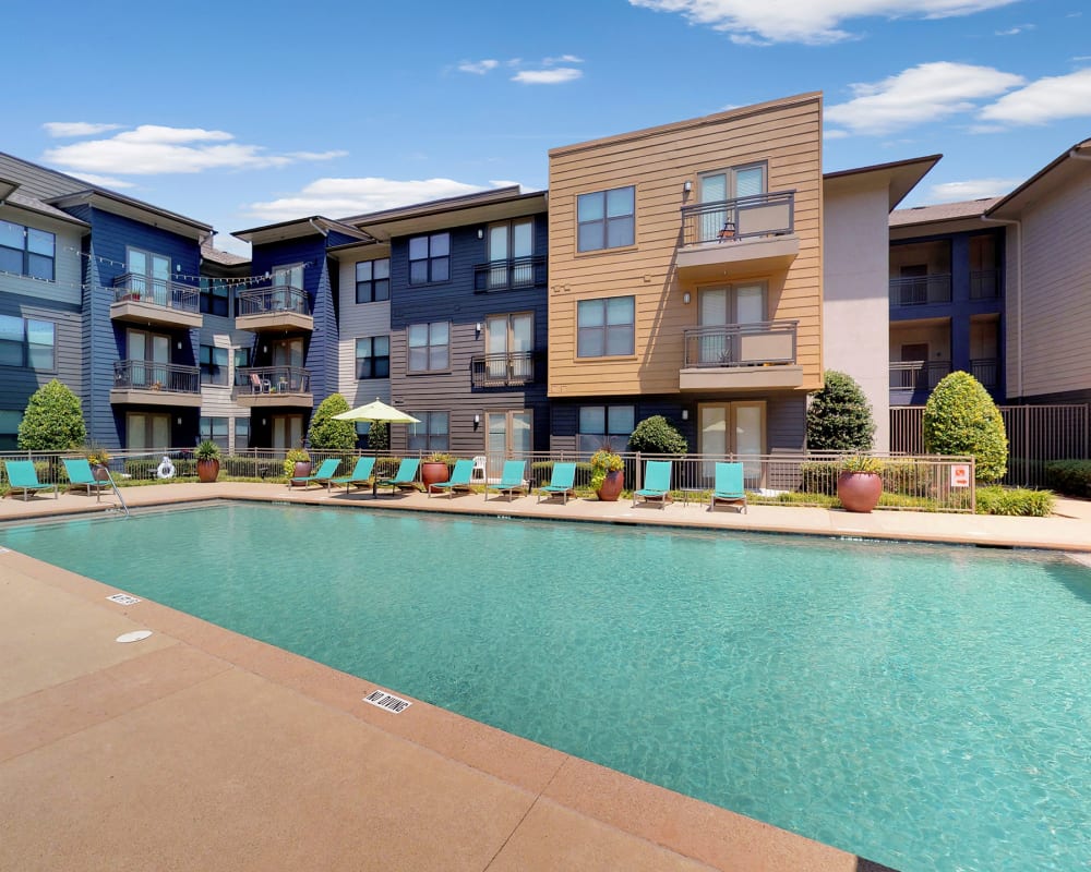 Sparkling swimming pool at 5th Street Crossing at City Station in Garland. Texas