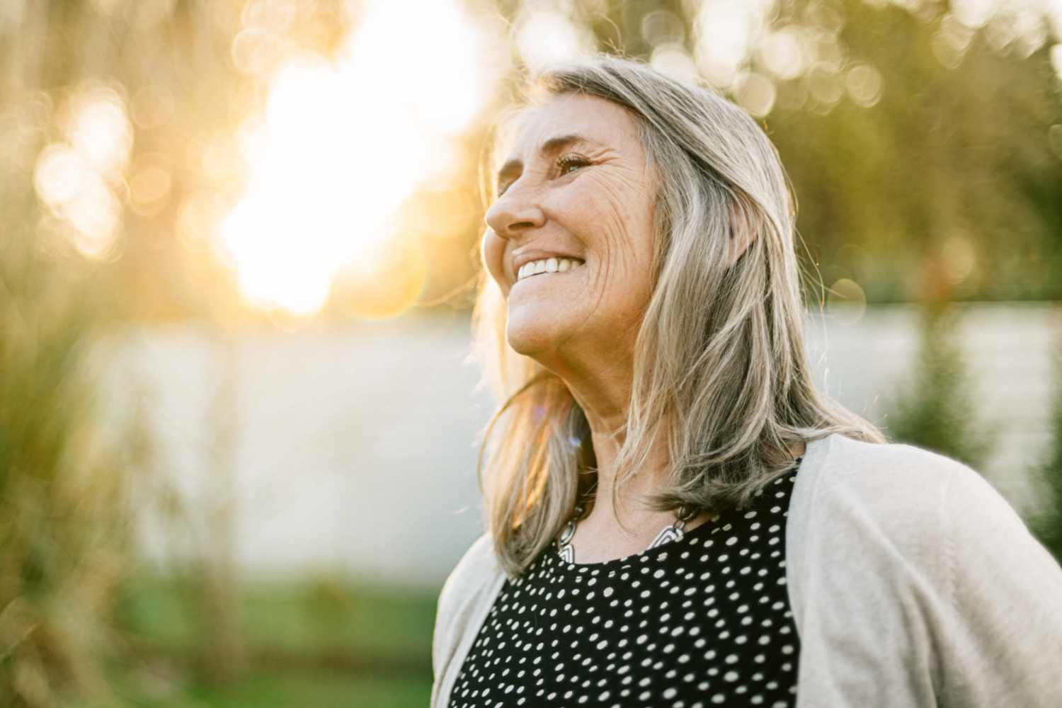 Senior resident in their garden with the plants at Curlin Commons in Mooresville, North Carolina