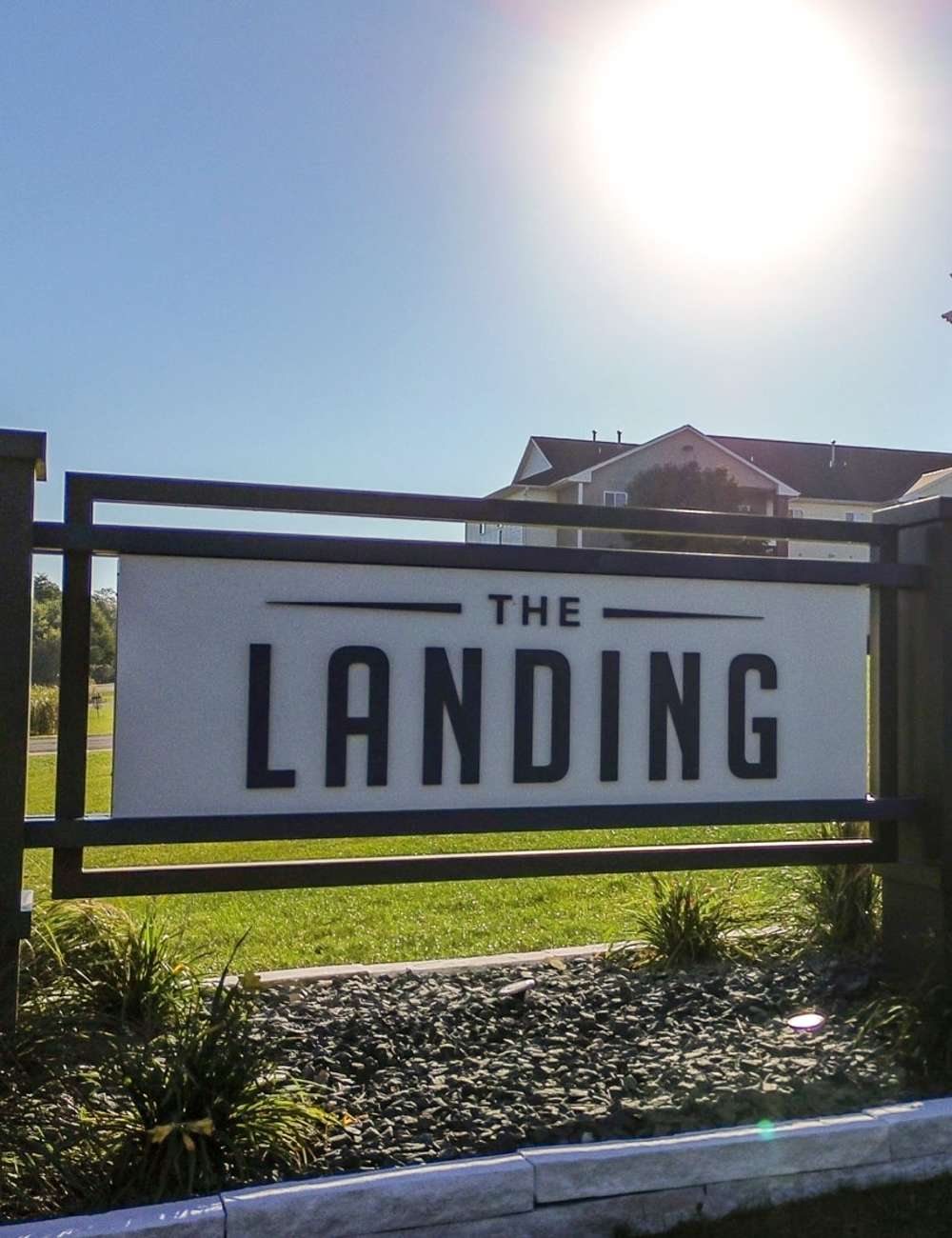 Residents with The Landing sign at The Landing Ames in Ames, Iowa