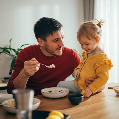Resident with his child at Red Knot at Edinburgh in Chesapeake, Virginia