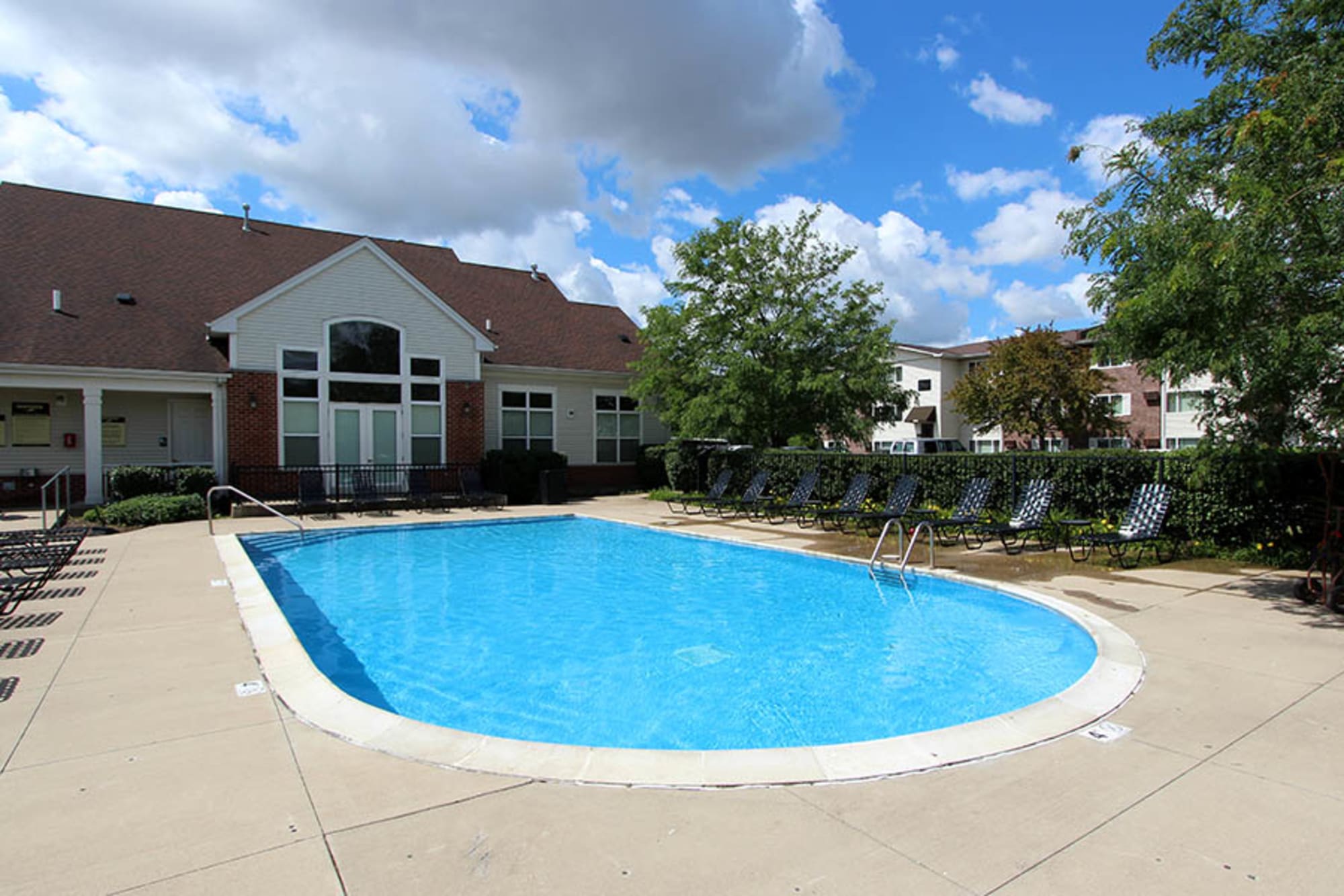 The swimming pool on a sunny day at Riverstone Apartments in Bolingbrook, Illinois