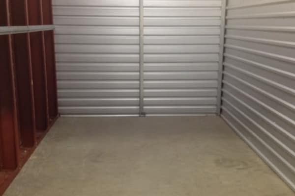 A spacious and clean storage unit at One Stop Storage.