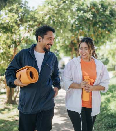 Resident couple walking in park near Lakeview in Fort Worth, Texas