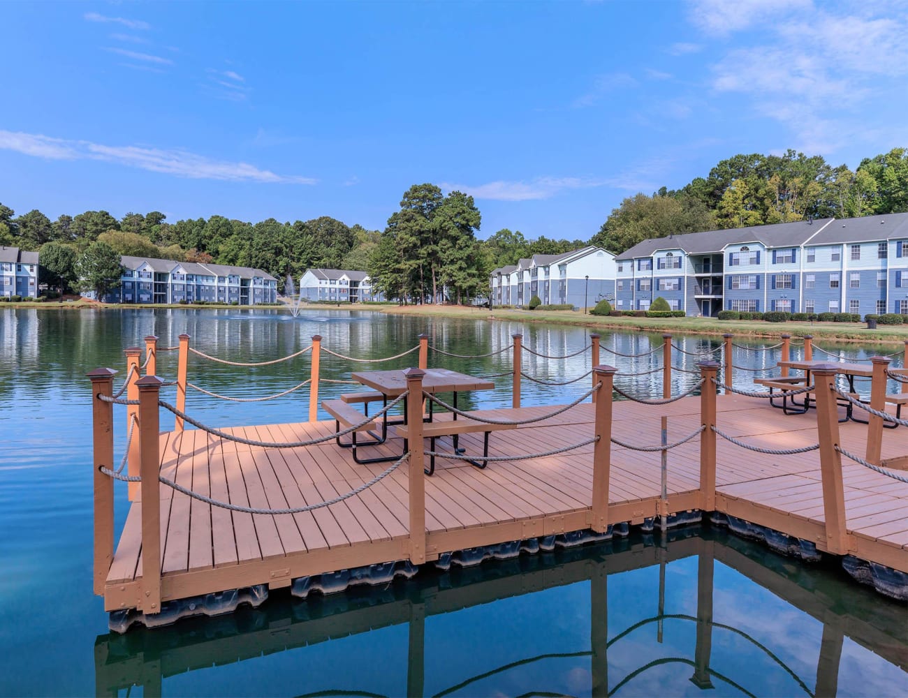 Picnic tables on the dock at The Bentley at Marietta in Marietta, Georgia