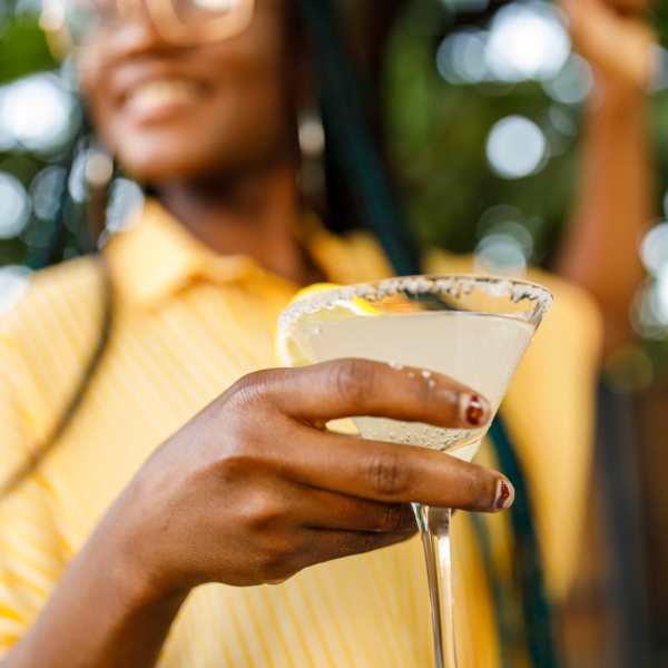 A resident enjoys a cocktail near Cedar Broad, Richmond, Virginia