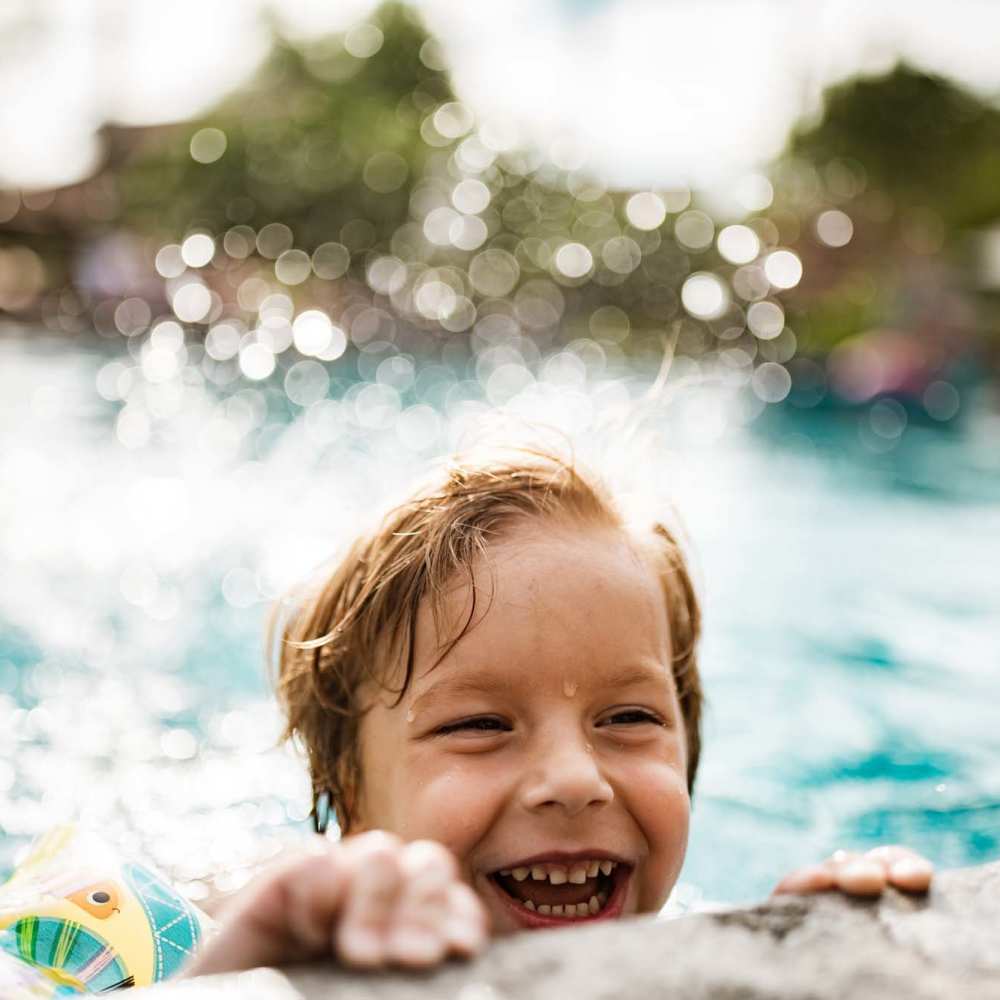 Kid playing in the swimming pool at The Crossing in Houston,Texas