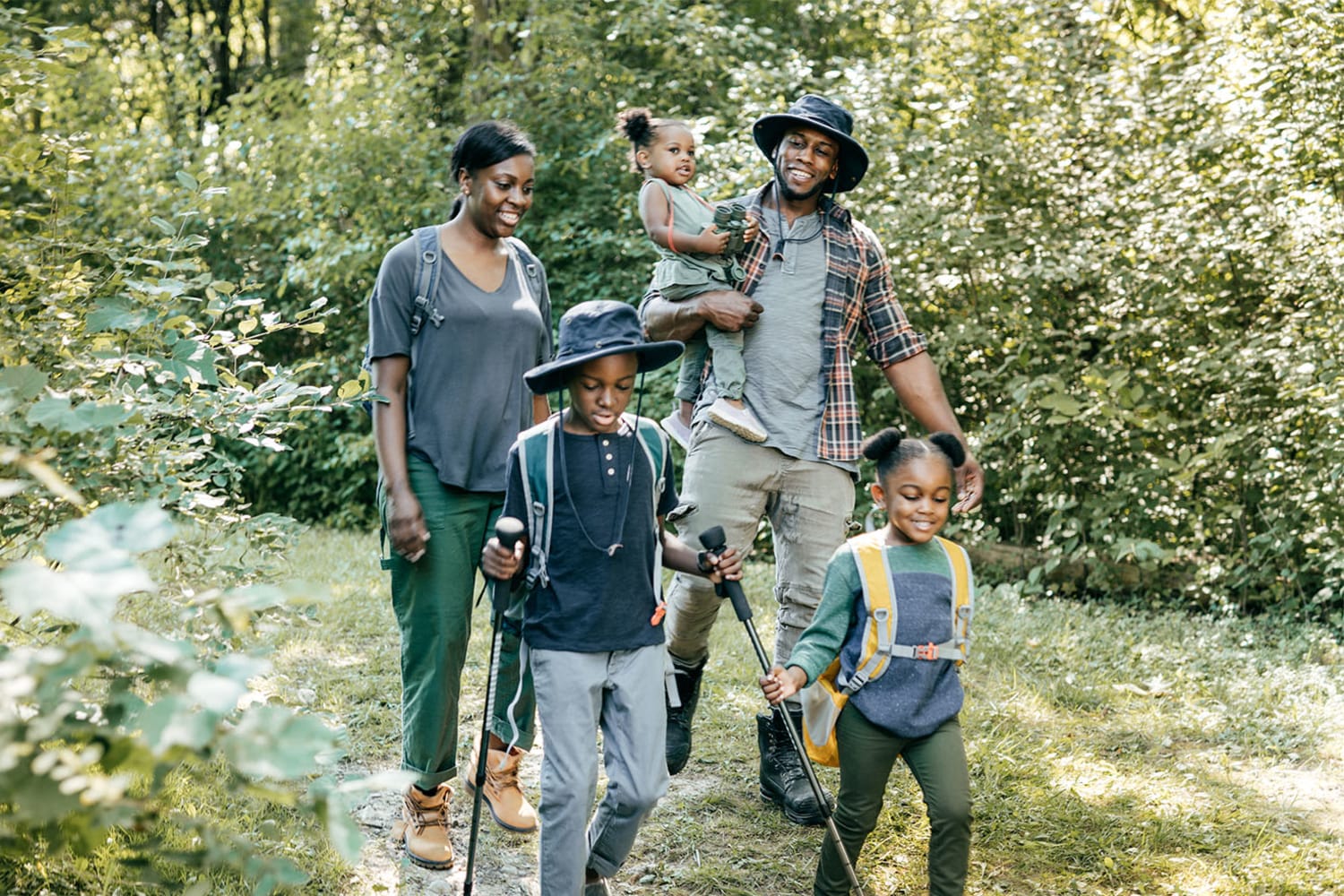 Family out on a nice hike in a park near Cloverbasin Village in Longmont, Colorado