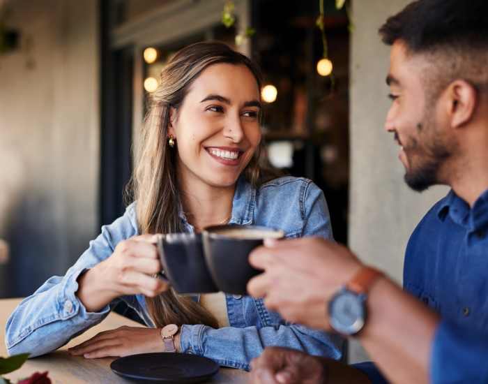 Resident couple enjoying coffee in a nearby cafe at Berry Shoals in Duncan, South Carolina
