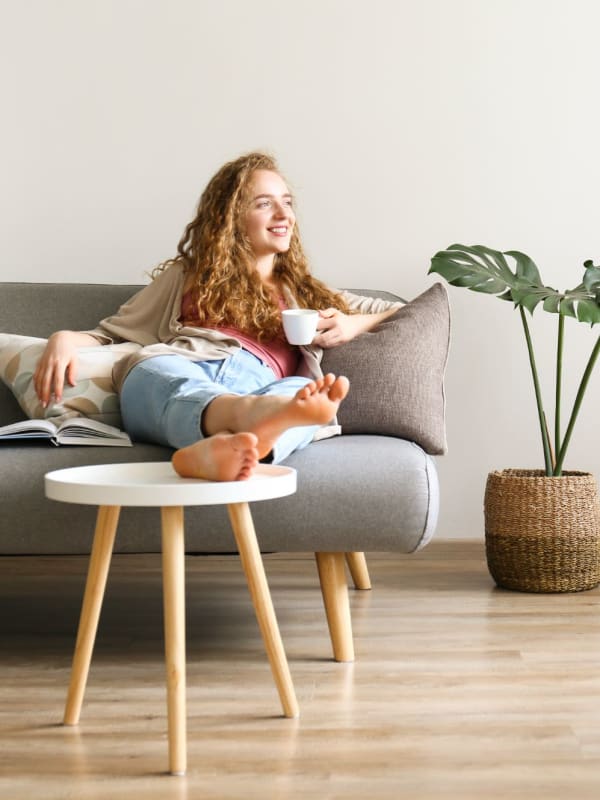 Happy resident relaxing at The Franciscan in Campbell, California