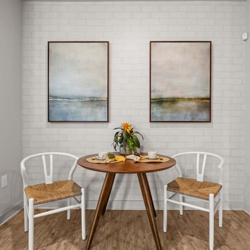 Seating space with coffee table and chairs at Pier Park Crossings in Panama City Beach, Florida