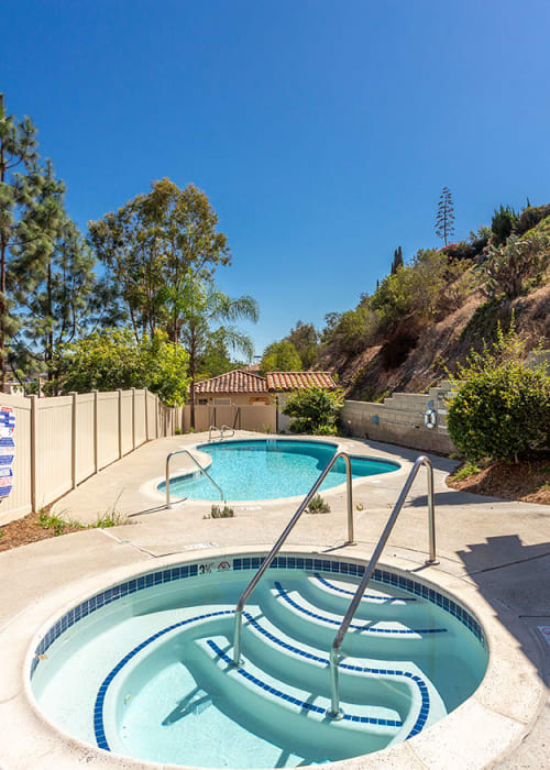 Kids swimming in the pool at Jackson 23 Apartments in La Mesa, California