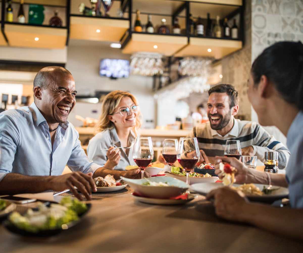 Residents enjoying the lunch at reataurant near Heron Pointe Apartments in Jacksonville, Florida