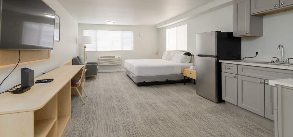 Spacious studios with air conditioning and TV's at Thea Apartments in Tacoma, Washington