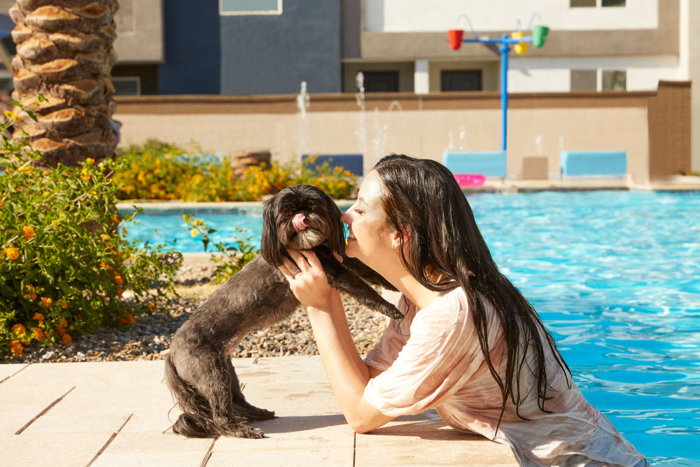 Woman and her dog at Las Casas at Windrose in Litchfield Park, Arizona