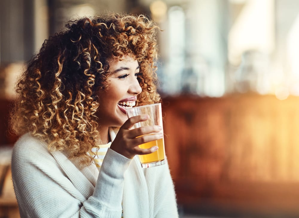 A woman takes a coffee break near Haven Hills in Vancouver, Washington