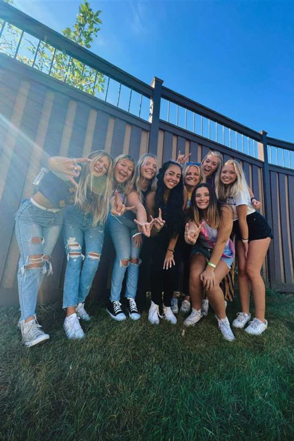 Group of residents smiling outdoors at College Town Mankato in Mankato, Minnesota