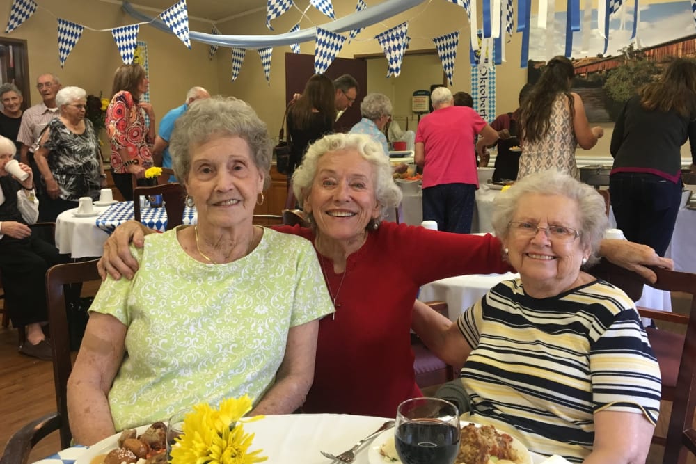 Residents smiling at an event at Lodi Commons Senior Living in Lodi, California
