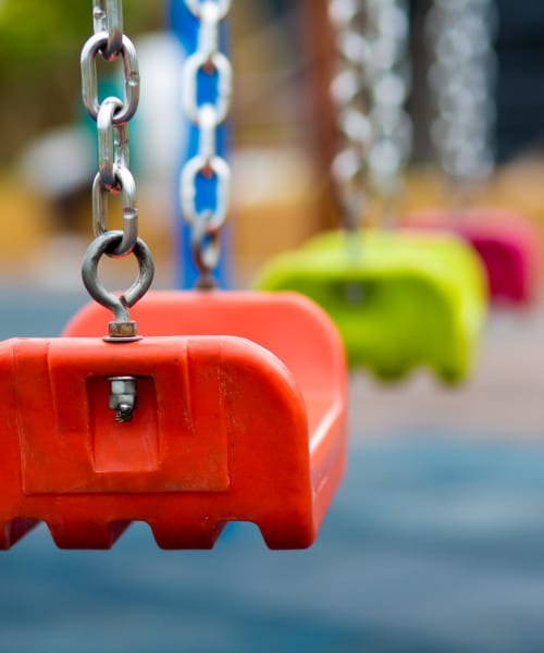 Colorful swings at a playground at Royal Oaks in Smithville, Tennessee