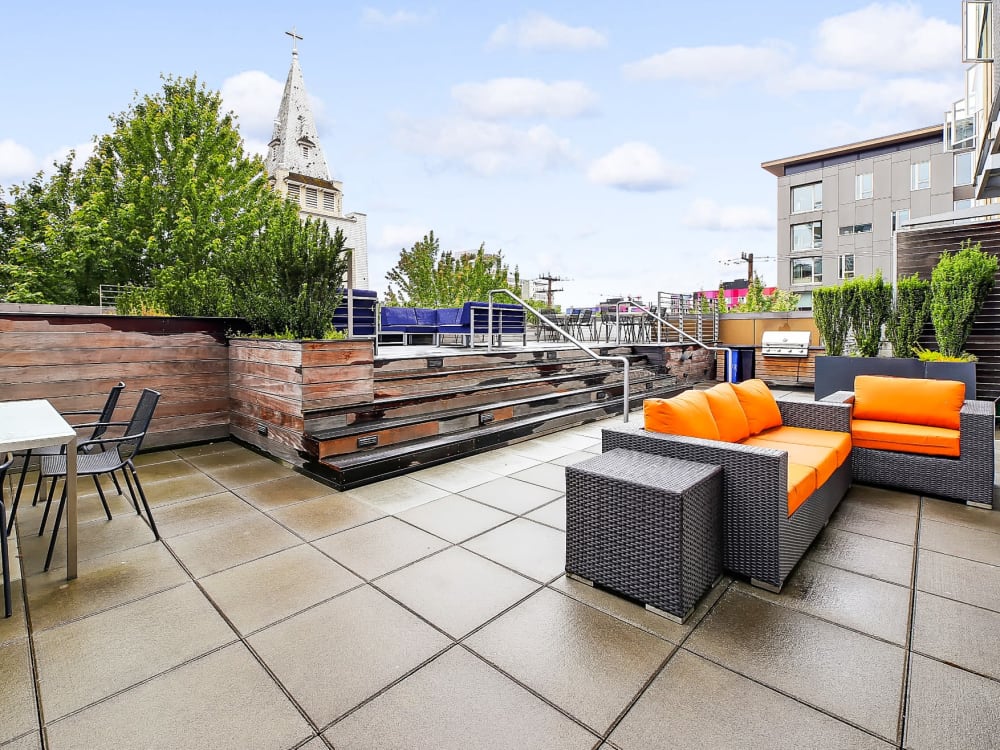 Cozy couches at the rooftop lounge area at Alley South Lake Union in Seattle, Washington