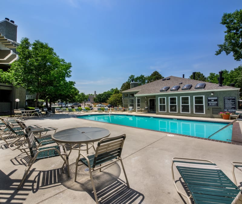 Plenty of seating near the pool at Waterfield Court Apartment Homes in Aurora, Colorado