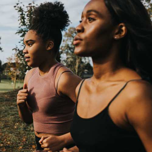 Residents on a morning jog through a park near Arden at South Point Apartment Homes in McDonough, Georgia